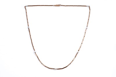 Lot 835 - A gold and baroque-pearl necklace