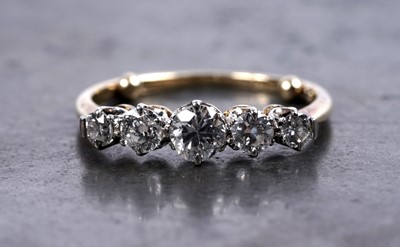 Lot 234 - A five-stone diamond ring