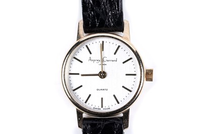 Lot 403 - A lady's Asprey and Garrard 9ct gold cased wristwatch