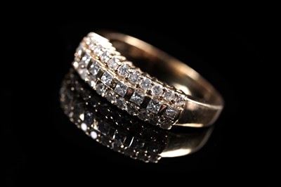 Lot 860 - A diamond dress ring