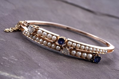 Lot 995 - A fine Victorian diamond, sapphire and half-pearl bangle