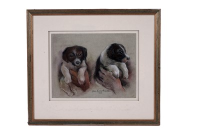 Lot 1525 - Sam Morse-Brown - A Saint Bernard puppy being held aloft