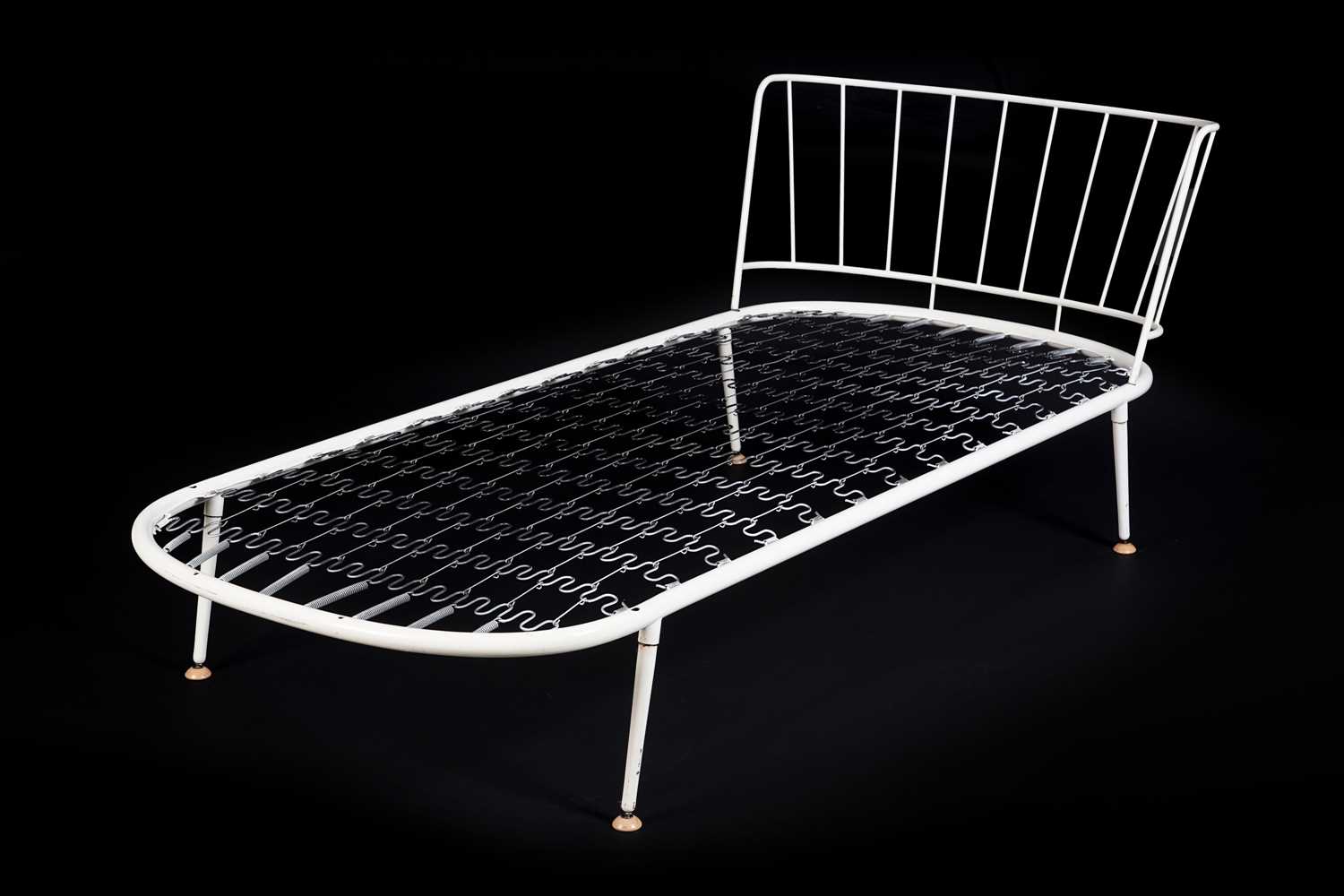 Lot 43 - Manner of Ernest Race: a white painted tubular steel bed frame and headboard