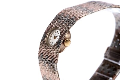 Lot 780 - Bueche Girod: a 9ct yellow, white and rose gold cocktail watch