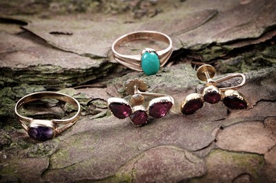 Lot 256 - A pair of early 20th Century garnet earrings; and two rings