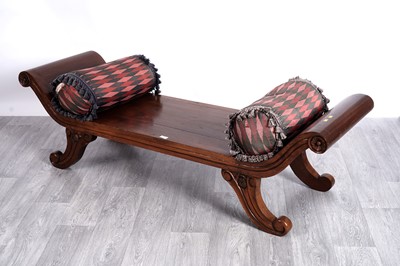Lot 32 - A Kartini style stained teak window seat/bench