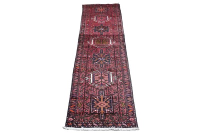 Lot 99 - A mid-20th Century hand-knotted Caucasian runner