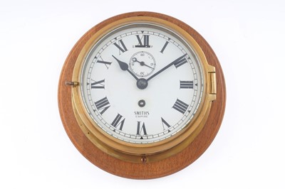 Lot 556 - A Smiths ‘Empire’ 30-hour brass ship’s bulkhead timepiece