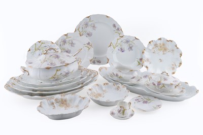 Lot 373 - An M. Redon Limoges dinner service; and a Lanternier Limoges part dinner service