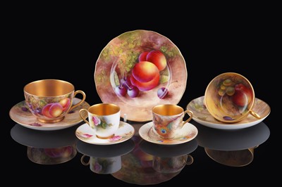 Lot 417 - Royal Worcester fruit painted cups, saucers, and plate