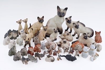 Lot 354 - A collection ceramic Siamese and other cat figures