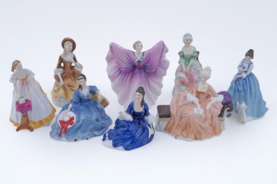 Lot 292 - A collection of eight Royal Doulton ceramic figures