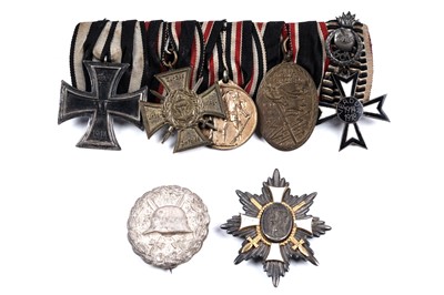 Lot 1140 - A German First World War Court Mounted group of five medals and two badges