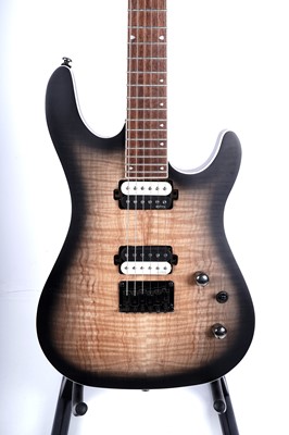 Lot 75 - A Cort KX300 electric guitar; and a Fender Mustang I V2 amp