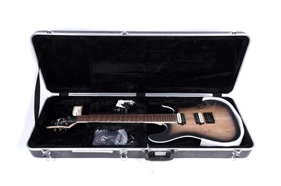 Lot 75 - A Cort KX300 electric guitar; and a Fender Mustang I V2 amp
