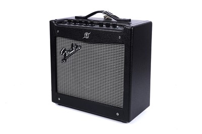 Lot 75 - A Cort KX300 electric guitar; and a Fender Mustang I V2 amp