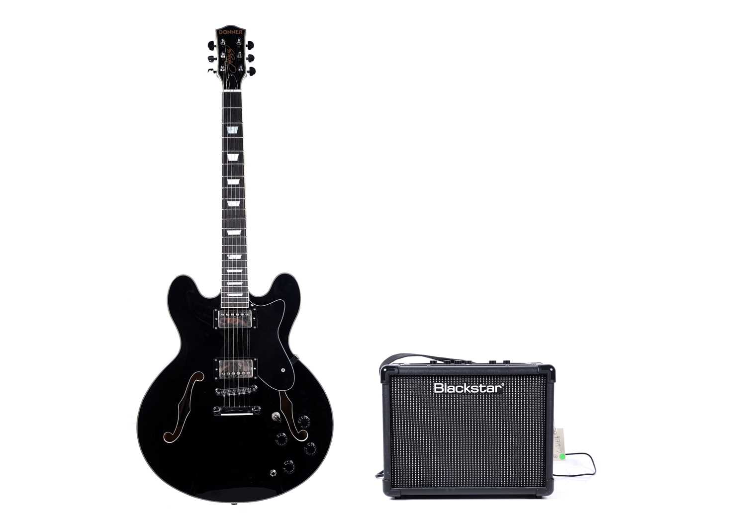 Lot 76 - A Donner Jazz guitar; and a Blackstar amplifier