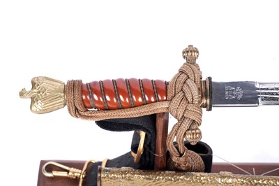 Lot 1196 - A German Second World War Kriegsmarine dress dagger with hangers and belt