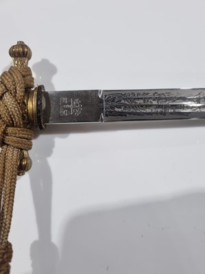 Lot 1196 - A German Second World War Kriegsmarine dress dagger with hangers and belt