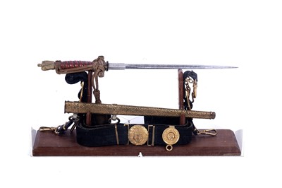 Lot 1196 - A German Second World War Kriegsmarine dress dagger with hangers and belt
