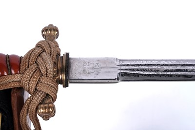Lot 1196 - A German Second World War Kriegsmarine dress dagger with hangers and belt