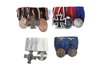 Lot 1152 - Four German medal groups