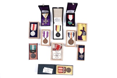 Lot 633 - A selection of Japanese medals, in cases of issue