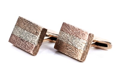 Lot 310 - A pair of tri-coloured 9ct gold cufflinks