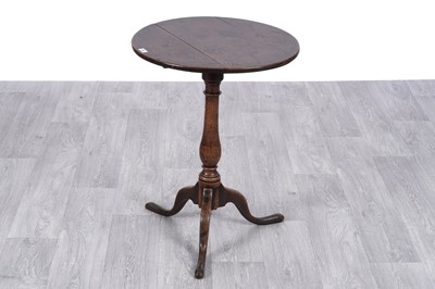 Lot 43 - A George III oak tilt-action tripod table