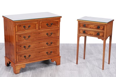 Lot 55 - A Georgian style yew wood chest of drawers; and another