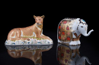 Lot 334 - Two boxed Royal Crown Derby paperweights