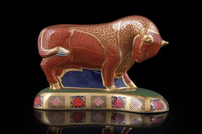 Lot 335 - A boxed Royal Crown Derby Harrod’s Bull paperweight