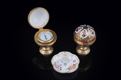 Lot 345 - A Royal Crown Derby posey five-petal tray; and a pair of globe barometers