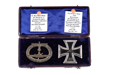 Lot 864 - A German Second World War Iron Cross 1st Class 1939, and U-Boat award badge to known recipient