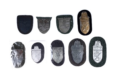 Lot 865 - A collection of German Second World War Campaign arm shields