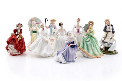 Lot 304 - A collection of nine boxed Royal Doulton ceramic figures