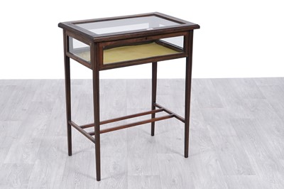 Lot 77 - An Edwardian inlaid walnut bijouterie table