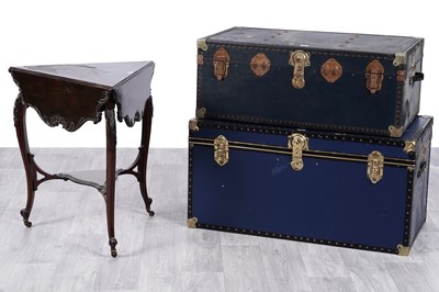 Lot 78 - Two 20th Century metal bound steamer trunks and a table