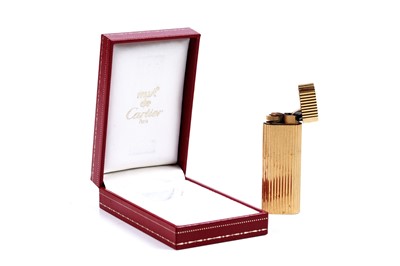 Lot 464 - A Must de Cartier gold plated lighter