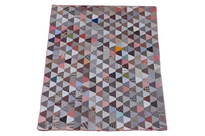 Lot 529 - A late 19th Century American "Tumbler Charm" patchwork quilt | 1880-90