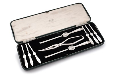 Lot 411 - A cased composite set of silver and silverplate Mappin and Webb lobster picks; and claw crackers