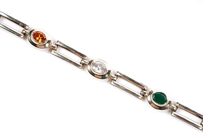 Lot 506 - A contemporary 14ct gold and paste bracelet