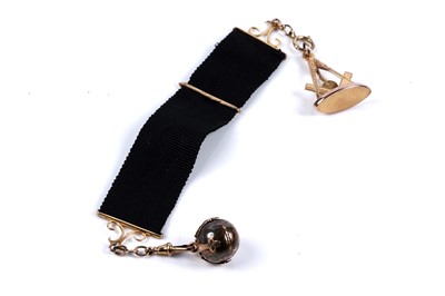 Lot 99 - An early 20th Century 9ct gold and black grosgrain Masonic watch ribbon