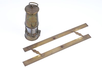 Lot 370 - A brass miner’s lamp; and a brass draughtsman’s rule