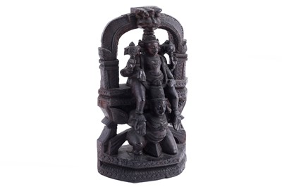 Lot 415 - A 20th Century hardwood carved study of Lord Vishnu