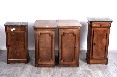 Lot 43 - Four walnut pedestals