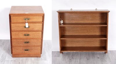 Lot 47 - An early 20th Century oak Arts & Crafts wall hanging bookcase; and a chest of drawers