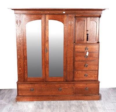 Lot 53 - An early 20th Century oak Arts & Crafts Liberty style wardrobe