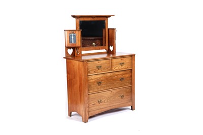Lot 613 - An Edwardian oak Arts and Crafts dressing chest