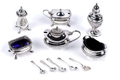 Lot 534 - Two silver condiment sets
